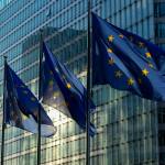 european commission flags on poles