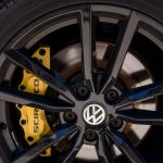 a black volkswagen rim in close up shot